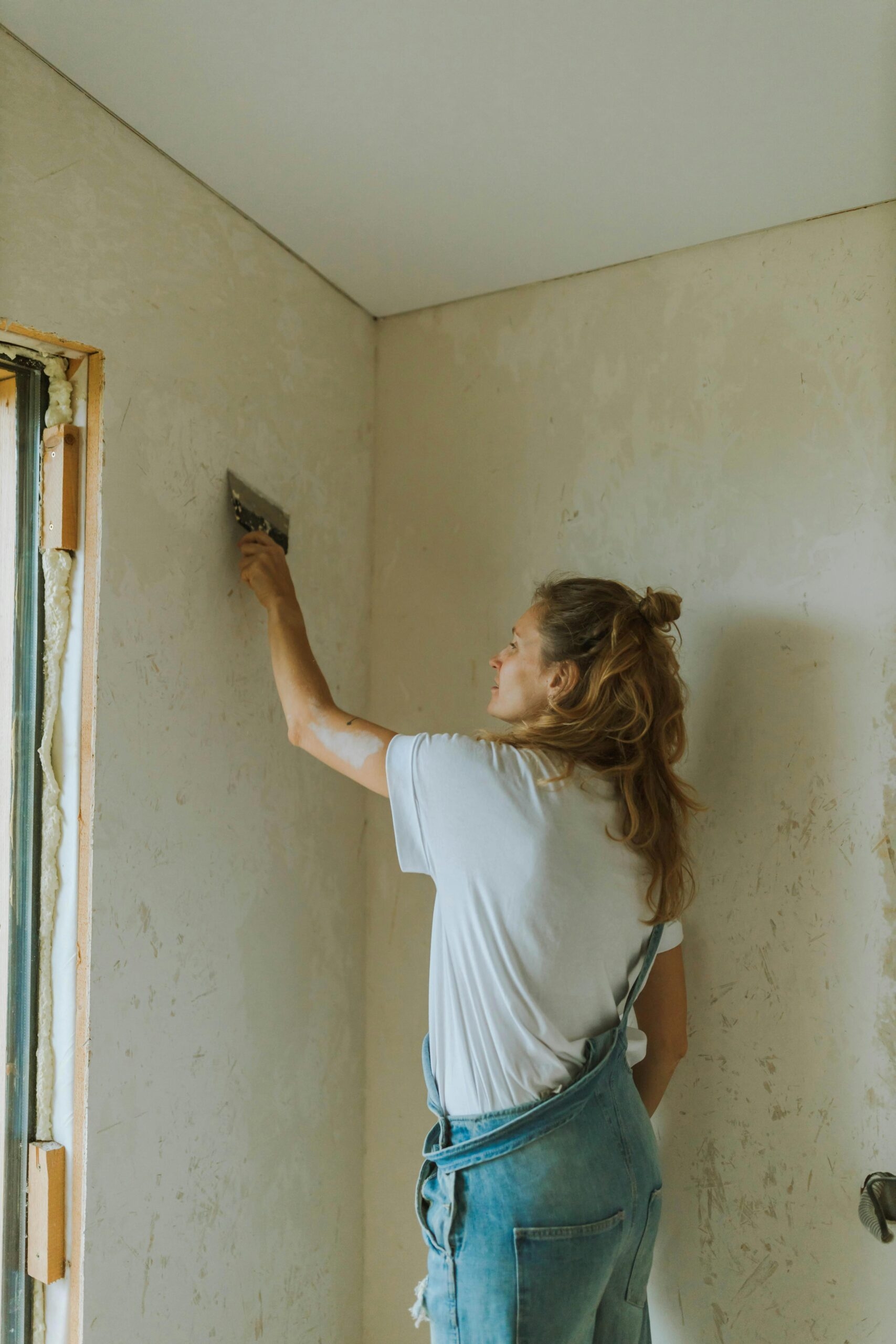 plaster wall coating crossword