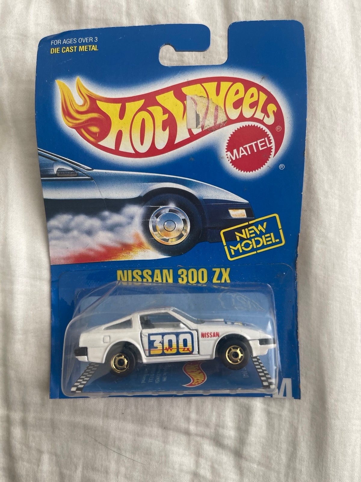 Hot Wheels 1990 Blue Card 54 Nissan 300 ZX White Gold HO s RARE HARD TO FIND Hot Wheels 1990 Blue Card 54 Nissan 300 ZX White Gold HO s RARE HARD TO FIND