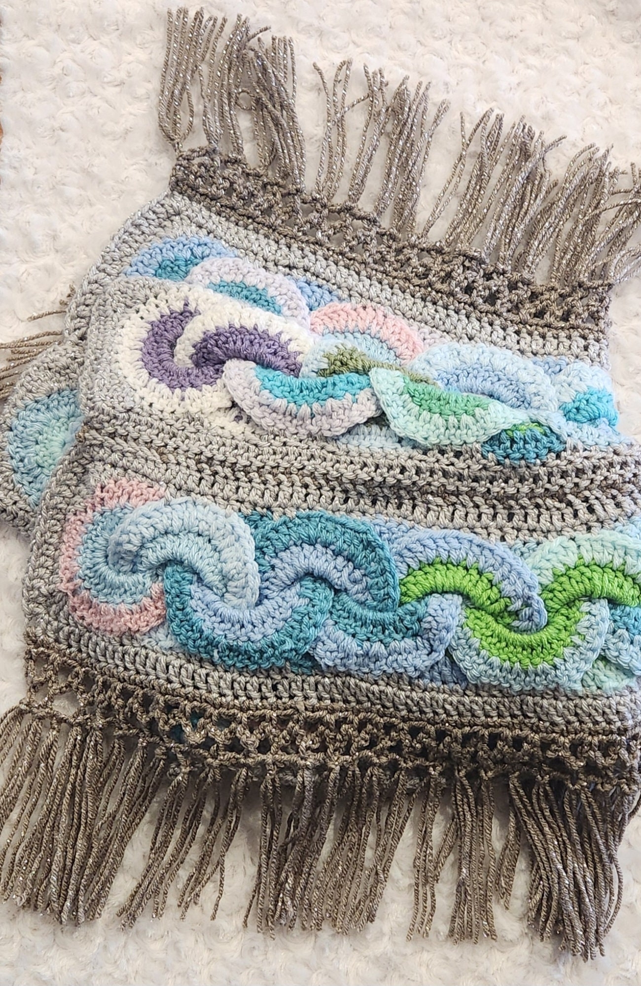 cloth that protects waves crossword