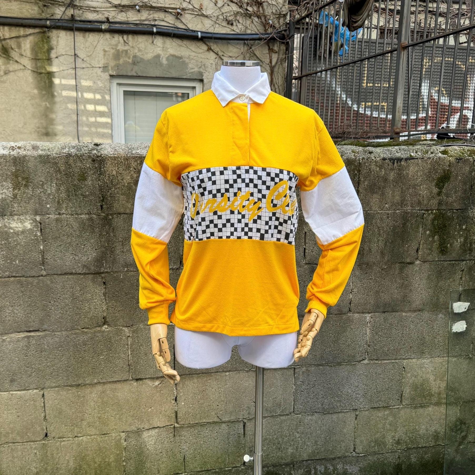 preppy shirts crossword